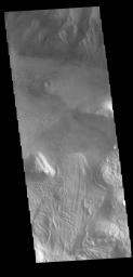 This image from NASA's Mars Odyssey shows the eastern side of Coprates Chasma, near Capri Chasma.