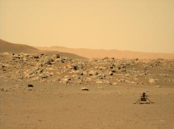 This image of NASA's Ingenuity Mars Helicopter was taken by the Mastcam-Z instrument of the Perseverance rover on June 15, 2021. The location, Airfield D, is just east of the Séítah geologic unit.