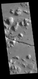 This image from NASA's Mars Odyssey shows linear depressions or graben called Cerberus Fossae.
