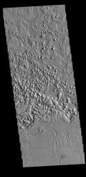 This image from NASA's Mars Odyssey shows a region of arcuate fractures and chaos on the highland/lowland boundary which is called Avernus Colles.