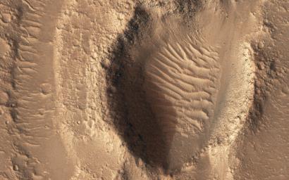 This image acquired on May 24, 2022 by NASA's Mars Reconnaissance Orbiter shows Hebrus Valles, a complex set of channels in the northern lowlands of Mars just to the west of the Elysium volcanic region.