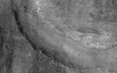 This image acquired on May 10, 2022 by NASA's Mars Reconnaissance Orbiter shows fluvial channels that cut through the ejecta from Jones Crater, indicating relatively younger water activity in the region.