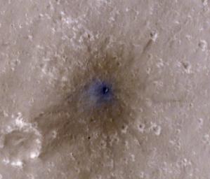 NASA's Mars Reconnaissance Orbiter captured this image of a meteoroid impact that was first detected by the agency's InSight lander using its seismometer. This crater was formed on Feb. 18, 2021.