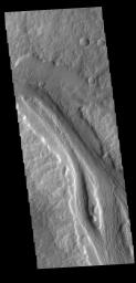 This image from NASA's Mars Odyssey shows a section of Labou Vallis. Labou Vallis is located south of Eumenides Dorsum and is 258 kilometers (160 miles) long.