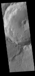 This image from NASA's Mars Odyssey shows a part of an unnamed crater in Terra Cimmeria. The finger-like projection from the southern rim towards the central peak is a landslide deposit.