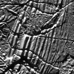 This view of Jupiter's moon Europa was captured in the 1990s by NASA's Galileo spacecraft. The smooth slopes and nearby rubble may have been produced by landslides.