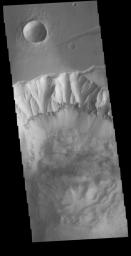 This image from NASA's Mars Odyssey shows part of the northern cliff face of Ophir Chasma.