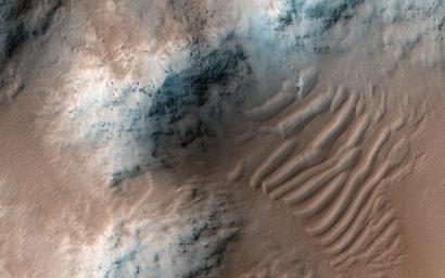 This image acquired on May 18, 2012 by NASA's Mars Reconnaissance Orbiter shows Echus Chaos, a region of low hills located between Lunae Planum and Echus Palus.