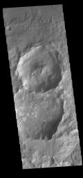 This image from NASA's Mars Odyssey shows two small landslide deposits within a crater.