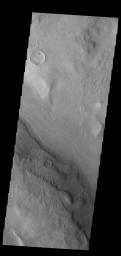 This image from NASA's Mars Odyssey shows a short section of Reull Vallis. Reull Vallis starts in Promethei Terra and empties into Hellas Plainitia.