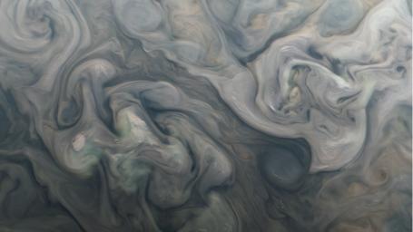 Swirling clouds on Jupiter are shown in an image taken by the JunoCam public engagement camera aboard NASA's Juno spacecraft on Feb. 25, 2022.