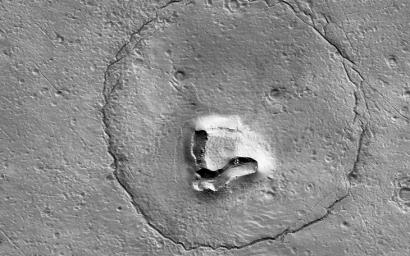 This image acquired on December 12, 2022 by NASA's Mars Reconnaissance Orbiter shows a feature that looks a bit like a bear's face.