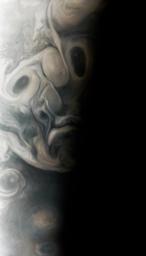 As often occurs in views from NASA's Juno mission, Jupiter's clouds in this picture lend themselves to pareidolia, the effect that causes observers to perceive faces or other patterns in largely random patterns.