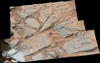 NASA's Curiosity rover captured this image of rhythmic rock layers with a repetitive pattern in their spacing and thickness. The pattern might have been caused by weather or climate cycles, such as dust storms happening at regular intervals.