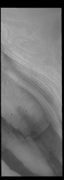 This image from NASA's Mars Odyssey shows part of the south polar cap. The cap is comprised of layers of ice and dust deposited over millions of years.