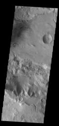 This image from NASA's Mars Odyssey shows a portion of Sirenum Fossae. The linear features are tectonic graben. Graben are formed by extension of the crust and faulting.
