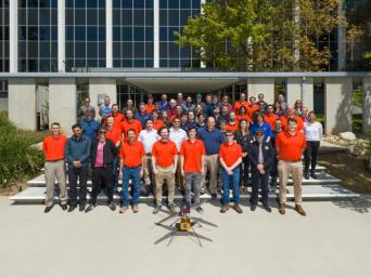 Members of NASA's Ingenuity Mars Helicopter team got together for a team photo on the second anniversary of the rotorcraft's first flight on Mars.