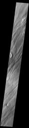 This image from NASA's Mars Odyssey shows Tantalus Fossae, a set of long valleys on the eastern side of Alba Mons.