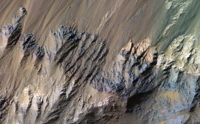This image acquired on July 11, 2023 by NASA's Mars Reconnaissance Orbiter shows the southern wall of Coprates Chasma, in the equatorial canyon system of Valles Marineris.