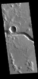 This image from NASA's Mars Odyssey shows part of Hephaestus Fossae. Hephaestus Fossae is a complex channel system in Utopia Planitia near Elysium Mons.