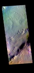 This image from NASA's Mars Odyssey shows part of the rim and floor of Pal Crater.