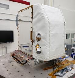 The imaging spectrometer sits at NASA's Jet Propulsion Laboratory in August 2023, before shipment to Planet Labs PBC in San Francisco. The instrument will be integrated into a Tanager satellite over the next several months.