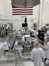Engineers prepare the imaging spectrometer – part of an effort led by the nonprofit Carbon Mapper to monitor greenhouse gas emissions – for vibration testing at JPL.