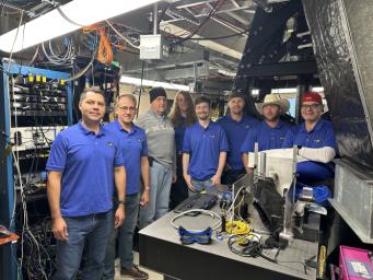DSOC ground laser transmitter operators pose for a photo at the Optical Communications Telescope Laboratory at JPL's Table Mountain Facility near Wrightwood, California, shortly after the technology demonstration achieved first light on Nov. 14, 2023.