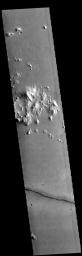 This image from NASA's Mars Odyssey shows a single linear depression, most likely a graben.