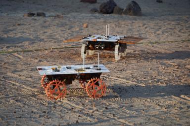 Two full-scale development model rovers are tested in JPL's Mars Yard in August 2023 as part of NASA's CADRE tech demo. These tests confirmed the project's hardware and software can work together to accomplish key goals.