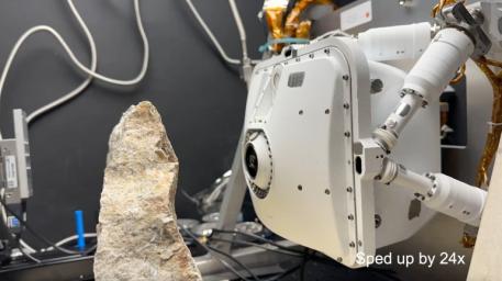 This time-lapse video uses an engineering model of one of the instruments aboard NASA's Perseverance Mars rover to show how the instrument evaluates safe placement against a rock.
