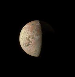 This image revealing the north polar region of the Jovian moon Io was taken on June 15 by NASA's Juno. Three of the mountain peaks visible in the upper part of image were observed here for the first time by the spacecraft's JunoCam.