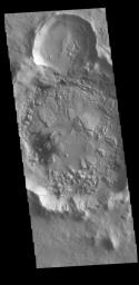 This image from NASA's Mars Odyssey shows an unnamed crater in Tartarus Colles.