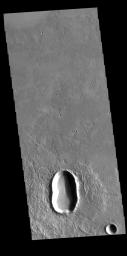 This image from NASA's Mars Odyssey shows an unnamed crater in Utopia Planitia, with an indentation in the crater rim at the middle of the crater.