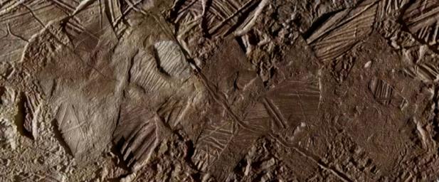 This image shows a close-up view of terrain within the region of Europa's surface named Conamara.