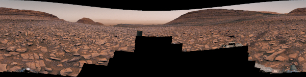 Curiosity captured this panorama using its Mastcam while heading west away from Gediz Vallis channel on Nov. 2, 2024. The Mars rover's tracks across the rocky terrain are visible at right.