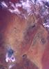 This color image of the Simpson Desert in Australia was obtained by NASA's Galileo spacecraft at about 2:30 p.m. PST, Dec. 8, 1990, at a range of more than 35,000 miles. 