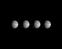 These four images of Jupiter and the luminous night-side impact of fragment W of Comet Shoemaker-Levy 9 were taken NASA's Galileo spacecraft on July 22, 1994.