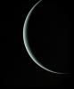 This view of pale blue-green Uranus was recorded by NASA's Voyager 2 on Jan 25, 1986, as the spacecraft left the planet behind. The thin crescent of Uranus is seen here between the spacecraft, the planet and the Sun.