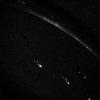 This NASA Voyager 1 image was taken of Jupiter's darkside on March 5, 1979 when the spacecraft was in Jupiter's shadow, about 6 hours after closest approach to the planet at a distance of 320,000 miles.