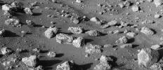 NASA's Viking Lander 2 captured this image of rocks nearby a large impact crater. Most rocks appear to have vesicles, or small holes, in them.