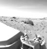 This Mars view looks northeast from NASA's Viking 1 and completes the 360 panorama of the landing site. A layer of haze can be seen in the Martian sky. Large dark boulders dominate the scene.