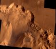 During its examination of Mars, NASA's Viking 1 spacecraft returned images of Valles Marineris, a huge canyon system, whose connected chasma or valleys may have formed from a combination of erosional collapse and structural activity.