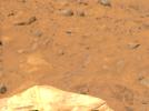 An area of Pathfinder's deflated airbags is visible in the lower portion of this image, taken by NASA's Imager for Mars Pathfinder (IMP) on July 8, 1997. The lighter areas of soil may be partially composed of salts.
