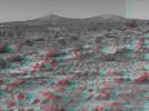 The two hills in the distance in this stereo image from NASA's Mars Pathfinder have been dubbed the 'Twin Peaks.' 3D glasses are necessary to identify surface detail.



