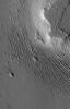 Extensive wind-swept plains of the Medusae Fossae formation on Mars are seen in this image from NASA's Mars Global Surveyor Orbiter.