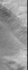 These images captured by NASA's Mars Global Surveyor show a ridged and cratered plain in southern Hesperia Planum on left, and a layered northeastern wall of a meteor impact crater in Noachis Terra on right.
