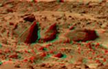 This view of 'Bookshelf Two' was produced by combining the 'Super Panorama' frames from the IMP camera from NASA's Mars Pathfinder lander. 3D glasses are necessary to identify surface detail. 