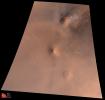 NASA's Mars Global Surveyor acquired this image on July 2, 1998. Shown here is is the Elysium volcanic region on Mars' red surface.