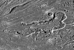 NASA's Galileo imaging camera targeted an area in Sippar Sulcus on Jupiter's moon, Ganymede. Images obtained in 1979 by NASA's Voyager spacecraft showed that the area contained curvilinear and arcuate scarps or cliffs.